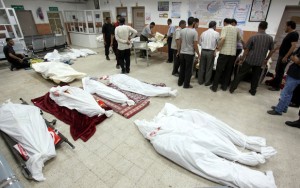 Bodies of Palestinians killed in an Israeli air strike on the floor of a hospital in Khan Younis, Gaza, earlier today. (Ramadan El-Agha / APA images)